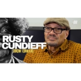 Enjoy 'Throw Forward' clip from  American film and television director, actor, and writer Rusty Cundieff sharing the story behind his classic horror movie 'Tales From The Hood'.